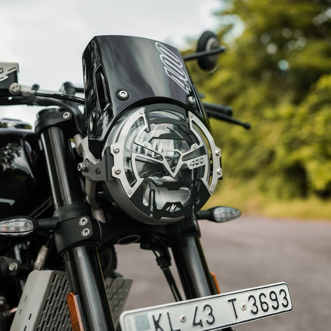 TRIUMPH TRACKER 400 COSMIC HEADLIGHT GRILL BLACK & SLIVER,